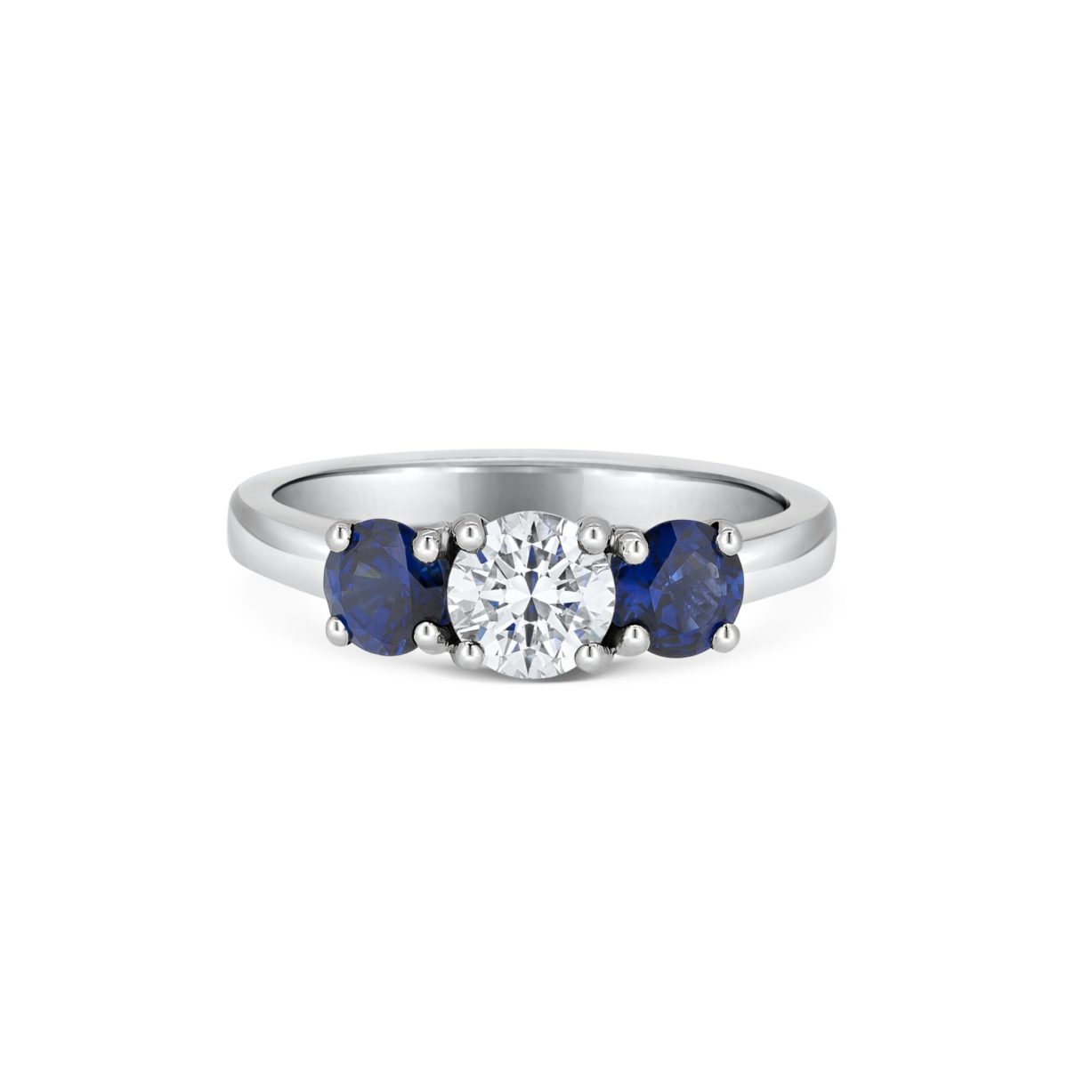 Catrina Round Cut Diamond Blue Sapphire Three Stone Engagement Ring