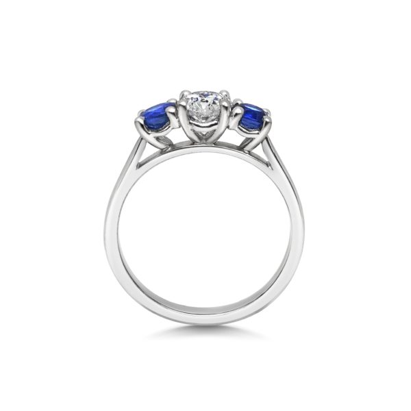 Catrina Round Cut Diamond Blue Sapphire Three Stone Engagement Ring