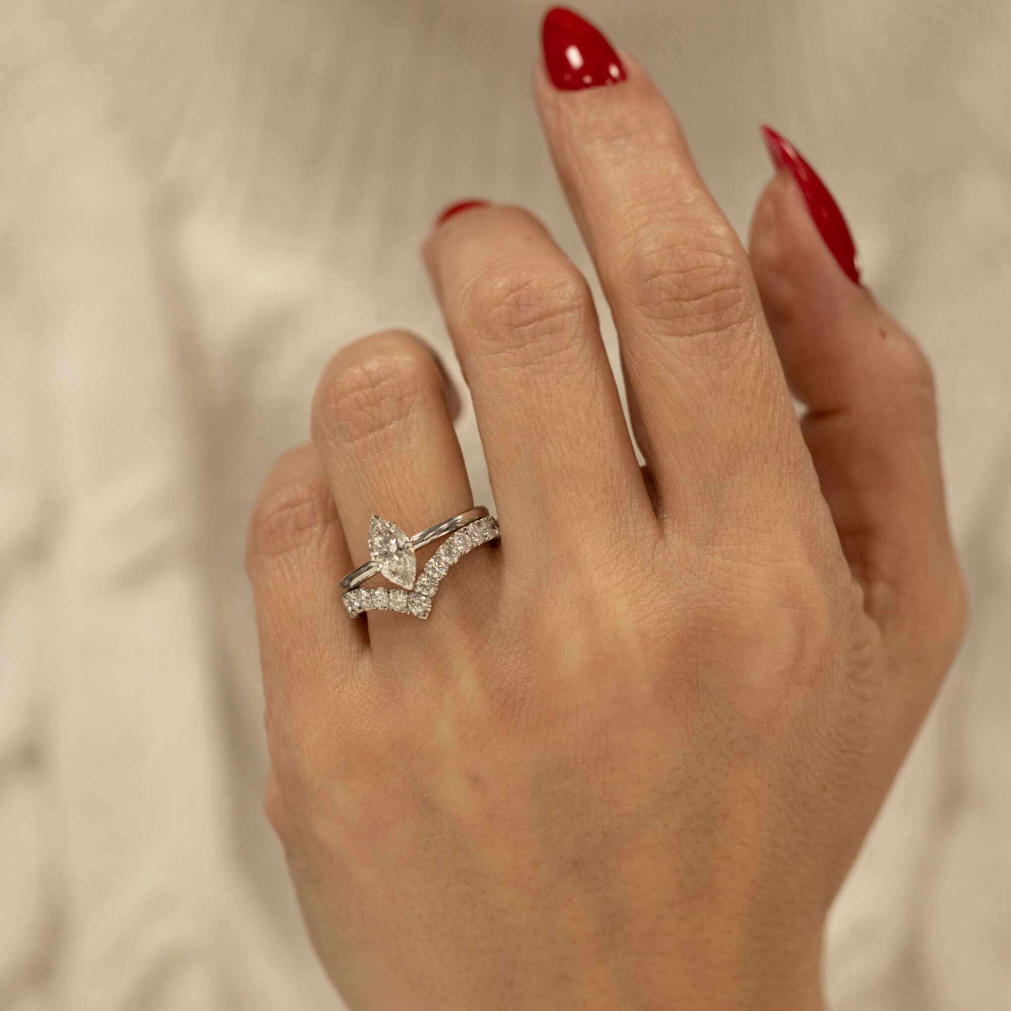 Marquise diamond hidden halo engagement ring in platinum, handmade in Hatton Garden London by Alan Bick